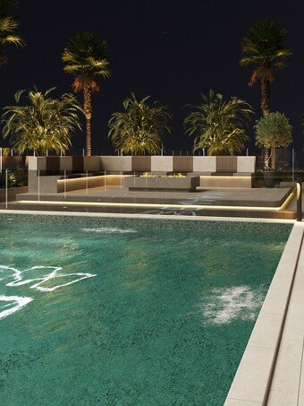 Azra Residence resort-style swimming pool at night