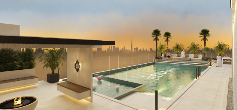 Rooftop infinity pool at sunset at Azra Residence, DLRC Dubai